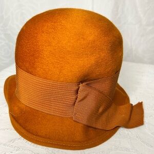 KUTZ Vintage Burnt Orange Wool Felt Women’s Cloche Hat with ribbon detail.